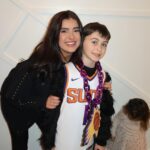 Kalani Hilliker Instagram - Big sis + lil bro date night to the Suns game🖤🏀☄️ Phoenix Suns Stadium