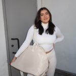 Kalani Hilliker Instagram - Travel in style this holiday season with the perfect Karry-All Bag 🎄🤍 last 3 days of the 12 days of Christmas 30% off site wide sale! Shop @karebykalani and use code HOLIDAYCHEER🧖🏼‍♀️💋✨