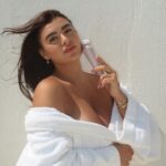 Kalani Hilliker Instagram - For all my skin care lovers…🩵 new @karebykalani klarify brush! Perfect to help clean the skin with multiple different attachments! Shop now at Kare.shop 🤍