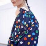 Kanika Kapoor Instagram - #LSAFashionFiles Singer and street style star Kanika Kapoor (@Kanik4kapoor) took on Paris as she made a striking appearance at the Louis Vuitton (@louisvuitton) show during Paris Fashion Week. Donning a polka-dotted zip-detail pantsuit with colourful spots, Kapoor lets us in on how she added a touch of whimsy to her ensemble. As she takes us to show, we can’t help but admire the set which was which was built to look like the interior of a hot air balloon in the signature Louis Vuitton orange and Nicolas Ghesquière’s (@nicolasghesquiere) treatment of couture-like RTW looks. #KanikaKapoor #LouisVuitton #ParisFashionWeek