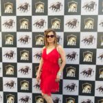 Kanika Maheshwari Instagram - There’s something magical about a red dress✨❤️ #horserace #race #horseriding #event #memory #good #fun #experience #new #horses #racing #heels #reddress #red #beautiful #lookinggood #feelingbeautiful #kanikamaheshwari Mahalaxmi Racecourse