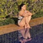 Kanika Maheshwari Instagram - Sun is keeping an eye on me Watch it guys I’m shining bright into your heart ❤️ Love me Hate me But you can’t ignore me #sun #sunlight #warmth #love #swimmingpool #swimwear #swimming #relaxing #swim #relaxation #mood #sunshine #happy #happiness #lovinglife #life #blessed #kanikamaheshwari