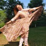Kanika Maheshwari Instagram - Draped in this suit, feeling like a modern-day princess, basking in the golden embrace of natural sunlight. 👑💖🌞 Suit: @ambraee_ #beautiful #beauty #love #suit #indiansuit #loving #instagood #photo #photooftheday #photography #sun #sunlight #nature #greenery #princess #amazing #kanikamaheshwari