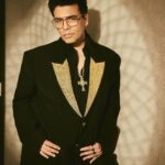 Karan Johar Instagram - All that glitters is……. At the technical awards for @filmfare #curtainraiser styled by @ekalakhani in @falgunishanepeacockindia the necklace by @sabyasachiofficial 📷 @sheldon.santos hair @rajeev_gogoi make up @paresh_kalgutkar