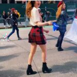 Karen Gillan Instagram - Throwback: Somehow the Scottish Tartan Day Parade fell on exactly the same day as my Hen (bachelorette) Do. So I got to have all my bridesmaids join me in leading the parade! They gave us a custom bottle of whisky BEFORE the parade and that is why we are the rowdiest ones there. WHAT DID THEY EXPECT #hen #bacherloretteparty #bridesmaids #scotland New York, New York