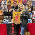 Kari Wahlgren Instagram - First day at @kamicon_official! Today’s highlight was seeing this amazing Fuu art at my table, and then getting to meet the artist @tsukimusha. Thank you for the beautiful gifted print!! 💗 Loved meeting some of you today, and can’t wait to meet all of you this weekend! #samuraichamploo #fanart #cosplay #convention