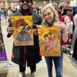 Kari Wahlgren Instagram - First day at @kamicon_official! Today’s highlight was seeing this amazing Fuu art at my table, and then getting to meet the artist @tsukimusha. Thank you for the beautiful gifted print!! 💗 Loved meeting some of you today, and can’t wait to meet all of you this weekend! #samuraichamploo #fanart #cosplay #convention