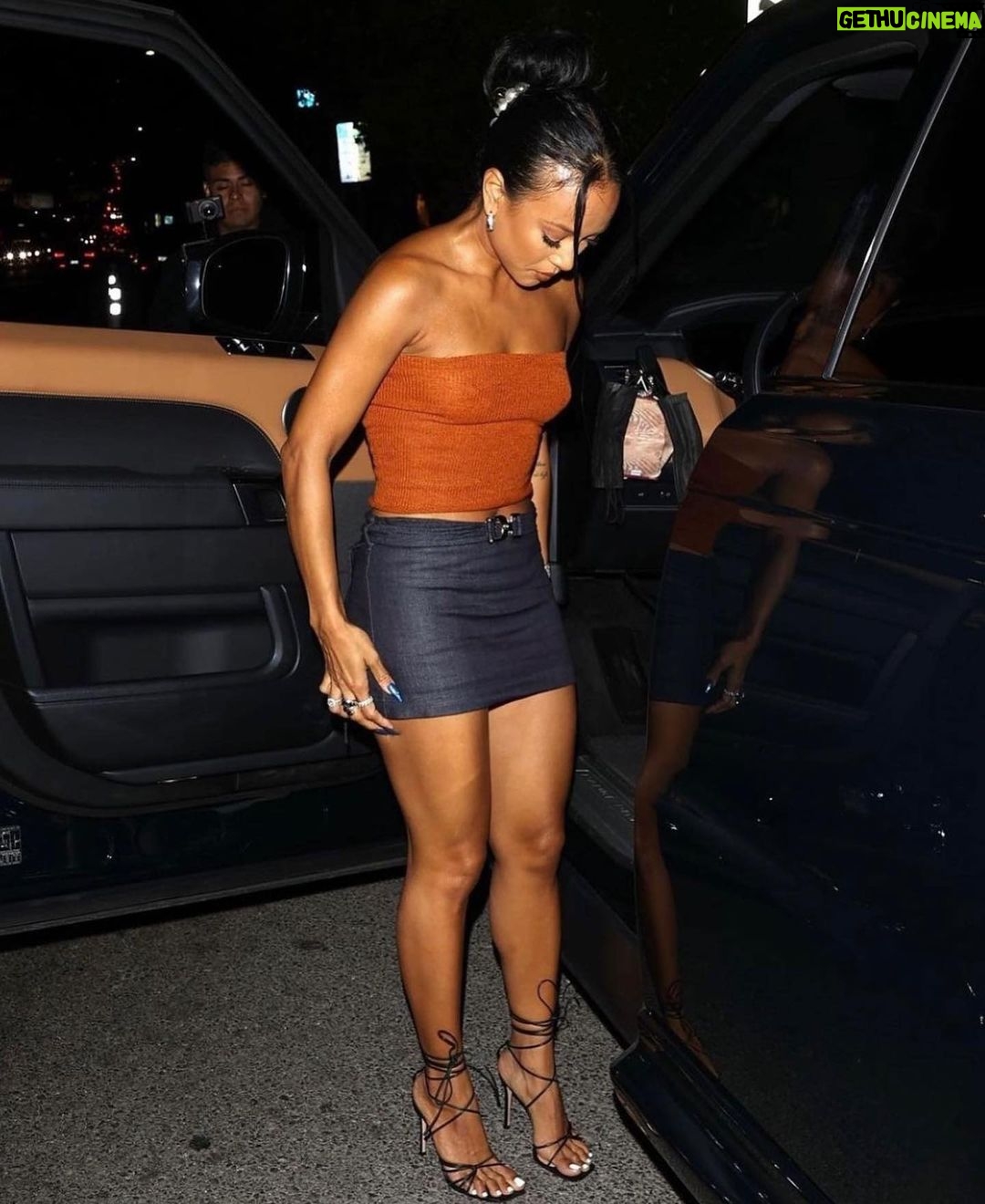 Karrueche Tran Instagram - mini skirts + leg day all summer Catch Steak LA