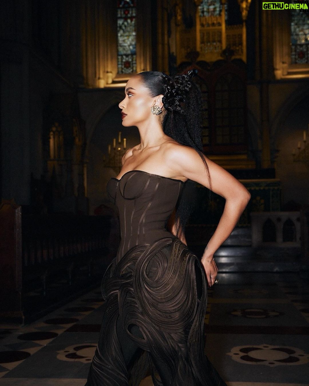Kat Graham Instagram - My first time wearing @GauravGuptaOfficial was at the NMACC in Mumbai to celebrate him and the culture of India. Every piece he creates feels like a celebration… like a firework that has turned into a spiral of shapes and sounds. His Haute Couture show was another one of those celebrations. He took us to church! Literally. The new collection was elegant. Chic. Bold. Whimsical and commanding. Those are his consistencies. One thing that particularly stood out to me was the spiritual elements within this collection (my favorite being the chakra dress, and the kundalini snake rings). Many of you know that one of my best friends is Hema @boseh1 who has helped bring the talented Gaurav into the pop zeitgeist. She and I can spend hours talking about fashion, impact, energy focus and what it means to be a brown girl hustling. We also always have at least one pair of earrings that we are holding hostage from the other… a currency to ensure we find each other in the world again. I am so deeply proud of you Hema and the team for what you continue to accomplish. From a little town in Calcutta to running PFW my love. @ggpanther You are limitless, just like your clothes. Paris, France