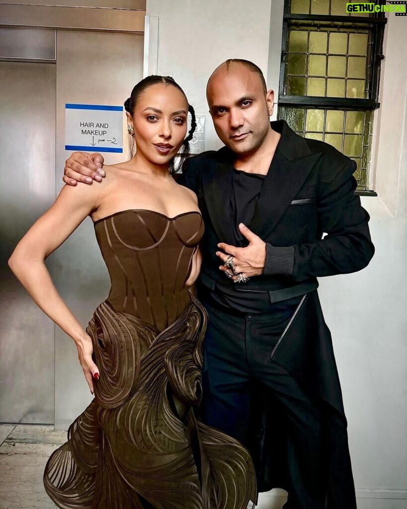 Kat Graham Instagram - My first time wearing @GauravGuptaOfficial was at the NMACC in Mumbai to celebrate him and the culture of India. Every piece he creates feels like a celebration… like a firework that has turned into a spiral of shapes and sounds. His Haute Couture show was another one of those celebrations. He took us to church! Literally. The new collection was elegant. Chic. Bold. Whimsical and commanding. Those are his consistencies. One thing that particularly stood out to me was the spiritual elements within this collection (my favorite being the chakra dress, and the kundalini snake rings). Many of you know that one of my best friends is Hema @boseh1 who has helped bring the talented Gaurav into the pop zeitgeist. She and I can spend hours talking about fashion, impact, energy focus and what it means to be a brown girl hustling. We also always have at least one pair of earrings that we are holding hostage from the other… a currency to ensure we find each other in the world again. I am so deeply proud of you Hema and the team for what you continue to accomplish. From a little town in Calcutta to running PFW my love. @ggpanther You are limitless, just like your clothes. Paris, France