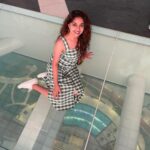 Keerthy Suresh Instagram - Kitty with a Kitty Bun! 🐱 Also, Duh! I am not scared of heights! 👀 #random #throwback #dubaidiaries