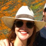 Kenneth Mitchell Instagram - Marinating in the wonderment of the Poppy Super Blooms with my #StarTrek buddy @couttsemily #LLAP #StarTrekDiscovery 🧡 Walker Canyon Poppy Fields