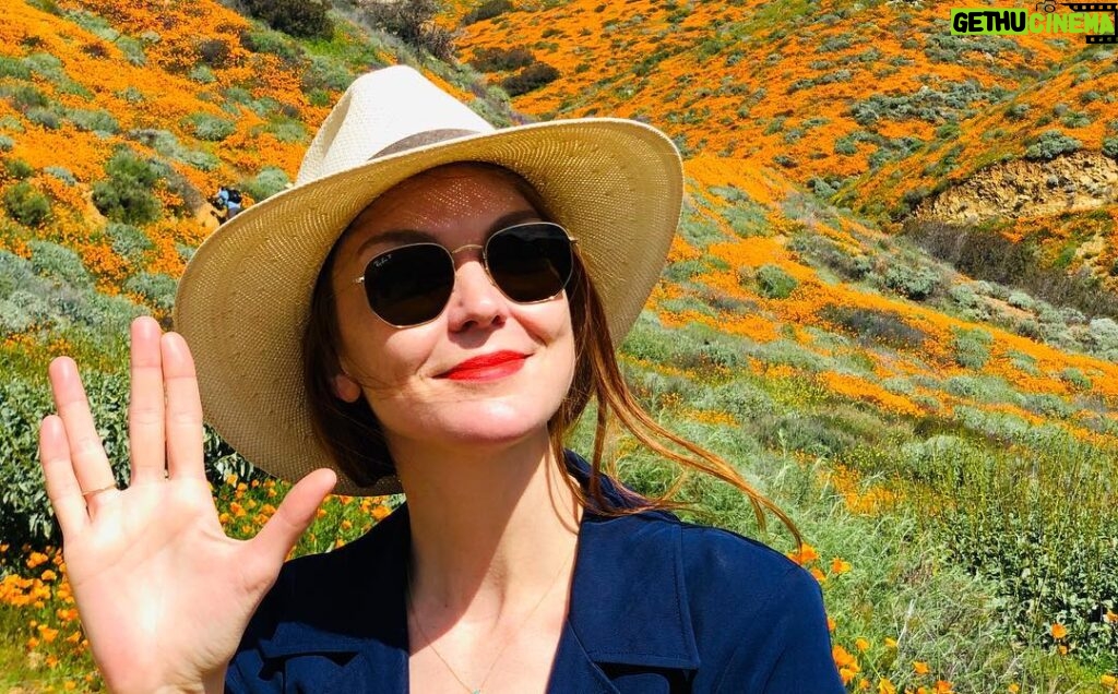 Kenneth Mitchell Instagram - Marinating in the wonderment of the Poppy Super Blooms with my #StarTrek buddy @couttsemily #LLAP #StarTrekDiscovery 🧡 Walker Canyon Poppy Fields