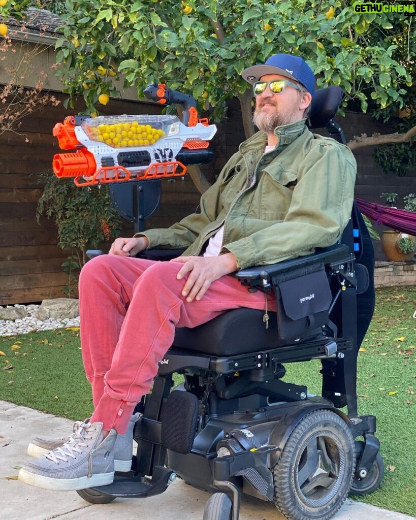 Kenneth Mitchell Instagram - NERF battle ready. {VIDEO} custom adaptive nerf blaster made accessible with a knee switch. Making lemonade from all these Lemons. This Life is a gift. Carpe Diem 🍋🍋🍋 #ALS #nerf California
