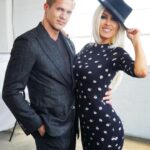 Kerri Kasem Instagram – Beautiful shots by @mattcali_photography! 

20 years ago Josh @shuaca and I did photos together, we looked like kids. I’ll put them up side-by-side on my stories. #Friends 

@sky_is_dlimit – stylist

Dress – @aliceandolivia 

Josh Make-up/Hair – @jackiemerlaumua 

#Blondehair #hat #LittleBlackDress #BestFriends
