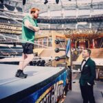 Kevin Patrick Egan Instagram - A little chin wag between two Northside Dubs before Wrestlemania in Hollywood. Sheamo wanted a quick scrap to warm up. Raheny vs Cabra. I negotiated a hug instead 😆👊🏼💚 Snaps by the great @richwadephoto 📸 SoFi Stadium