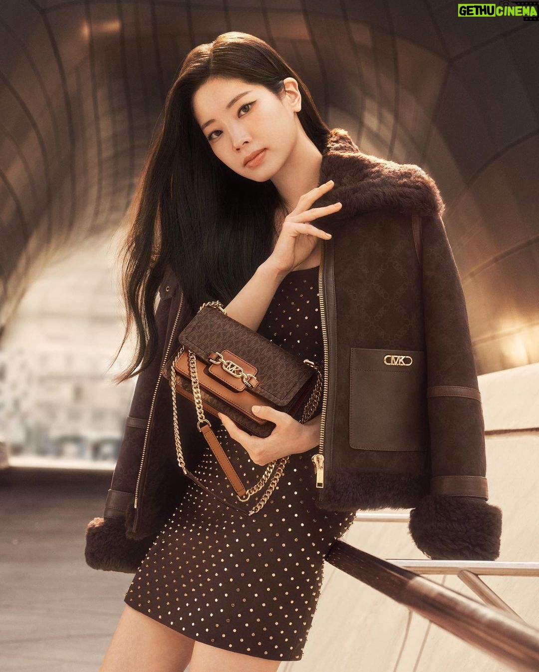 Kim Da-hyun Instagram - Introducing Dahyun, member of the global group TWICE, as our newest Global Brand Ambassador. The South Korean-native and musical sensation stars in our latest campaign, holding the Signature Logo Heather bag. #MichaelKors Photographed by @LachlanBailey Seoul, South Korea