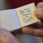 King Charles III of the United Kingdom Instagram - During a reception at Windsor Castle to celebrate the newly announced Modern-Day Miniature Library, created to mark Queen Mary’s Dolls’ House’s Centenary, The Queen was shown her own handwritten contribution to the initiative for the first time, in its final form. Keep an eye on @royalcollectiontrust to explore more miniature handwritten manuscripts written by 20 contemporary writers and illustrators - from short stories, poetry and illustrated tales to plays, articles and recipes, many inspired by the Dolls’ House or written specially for the occasion!