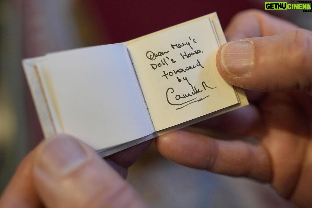 King Charles III of the United Kingdom Instagram - During a reception at Windsor Castle to celebrate the newly announced Modern-Day Miniature Library, created to mark Queen Mary’s Dolls’ House’s Centenary, The Queen was shown her own handwritten contribution to the initiative for the first time, in its final form. Keep an eye on @royalcollectiontrust to explore more miniature handwritten manuscripts written by 20 contemporary writers and illustrators - from short stories, poetry and illustrated tales to plays, articles and recipes, many inspired by the Dolls’ House or written specially for the occasion!