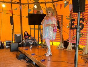 Kiri Pritchard-McLean Instagram - What a life changing few days I've had.
I went to my first ever Eisteddfod and thankfully @s4c made sure I was nestled under the ample bosom of the sweetest, funniest and kindest teacher there is, @magginoggi .

Growing up in Wales and being denied the language when you're young you sense there's stuff you're missing out on but I couldn't have imagined just how much until I visited the Eisteddfod this year. It's indescribable. Part music festival, part food festival, part gallery space, part folk festival,part talent show all Welsh. I was amazed how many people and organisations I knew, how many small businesses I love were there and even though I'd never been before it felt like it had always been waiting for me in a way. 
It's a really magical space. Honestly, I spent the first day fluctuating between laughter and joy and sadness. I was sad I didn't have this in my upbringing - I would have loved it. But, as @tudur reminded me, I have it now. The Eisteddfod can be mine too and just like so many things I've encountered on my Welsh language journey, I've realised when I'm ready for it, it'll welcome me with open arms. 

Oh yeah, and I did stand up in Welsh and as much as I loved it, I think the stress of doing it has knocked about 4 years off my life.