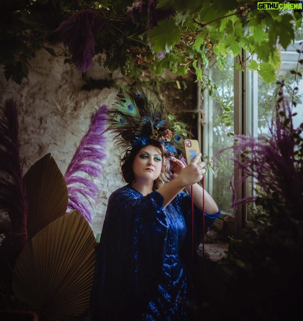 Kiri Pritchard-McLean Instagram - A little outtake from my Peacock photo shoot that shows me being very vain, but also being sat on a wobbly stool in my potting shed, freezing my tits off. This is a good time to say a huge thanks to everyone who's bought tickets to my tour already. You're so kind and I'm going to make sure we have the best time on all these dates. I'm still pinching myself that a have a few sold out dates already and a handful of others close behind. 📸 @_drewforsyth 💄 @alexogdenclark 👗 @fumbalinas 🦚 @philjperry