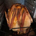 Kirsten Gillibrand Instagram - The turkey is just about done! I cover my turkey in bacon before I cook it - it keeps it super moist and flavorful. Here are my Thanksgiving recipes: Thanksgiving Turkey 🦃 Start with a fresh turkey (if it’s frozen it takes 3 or 4 days to defrost in the refrigerator). Rub the inside cavity with salt. Add 1 apple and 1 onion cut in sections to the cavity for moisture. Put in roasting pan with a cup of water for moisture. Cover entire bird with bacon. Bake at 325 for 20 minutes a pound. Check after 1 hour and remove bacon (so you can eat it!) After the bacon is removed, tent it with aluminum foil so top doesn’t burn. Let rest for 20 minutes when done before you carve it. Recipe for Thanksgiving savory stuffing: Sauté in 2-3 tbs of olive oil (or butter if you prefer): 1 whole large onion sliced 6 stalks of celery sliced 2 cups sliced mushrooms All to taste: 1 tbs summer savory 1 tsp sage 1 tsp thyme 1 tsp rosemary 1 tbs parsley flakes Salt and pepper to taste Combine sautéed vegetables with 8-12 cups of dried bread cubes (or amount that fits your pan). Add 2-4 cups of turkey broth (if you save giblets from your turkey you can simmer them for an hour and use that broth) until moist but not sticky. Add to a 9x13 greased (butter or olive oil) baking dish and bake for 45 minutes. Happy Thanksgiving!