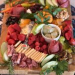 Kristen Ashley Instagram - I give up. This is the charcuterie board our friend Susan made for E’s birthday. This is such sheer perfection, I’m never attempting another board again. We were almost afraid to touch it (we did)! Elvira would be proud. #lifeintherockchicklane