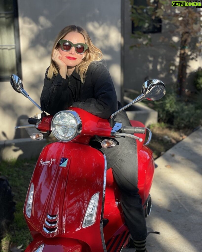 Kristen Bell Instagram - I said, “I don’t like motorcycles they’re too loud.“ He said, “oh yeah, well this one is electric.“ I said, “it would have to match my lipstick.“ He said, “BOOM!” I said, “Fine. Let’s ride, bitch.” @vespa @red
