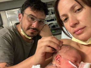 Kristen Gutoskie Instagram - Well, we made it through the 4th trimester. Woosh what a ride. 
I get emotional going through pictures to post this because wow what a 3.5 months it has been. It has been the most beautiful and most challenging time in my life adjusting to motherhood, and I am deeply grateful for the honour. 

Our beautiful Lennon Libráda entered the world on a full moon, a week early on June 3rd, 2023. Named in ode to his great Grandpa and great Tita. We had an incredible labour that started at the Dodgers game, so LA of him. 17 hours later, he was here. I would love to share my labour story at some point in the future 💕

We spent a hard week in the nicu but our tough little guy just took minute to get used to being on the outside :)

And since then it has been a whirlwind. I will be honest to say I really struggled with the ups and downs of hormones and healing in postpartum and learning to parent so instantly. You love this new creature so much it’s painful. Your old life is in the rear view mirror. Breastfeeding is so freaking hard at first and my god, the sleep deprivation. 

But here we are, finally getting the hang of it. Seeing our love’s personality emerge and all the smiles and coo’s and watching him discover things for the first time is just the best thing I’ve ever witnessed. Watching @brianleeboehner be such a beautiful papa reading Lennon books every morning and changing diapers like a boss. 

Every morning when we wake up, I say “I love youuu” and Lennon returns it with “Ow gooo”. Hands down my favourite new word. 

I am deeply humbled to be your mama Lenny Bear, the greatest love I’ve ever known. Cannot wait to see what else this journey has in store for us.