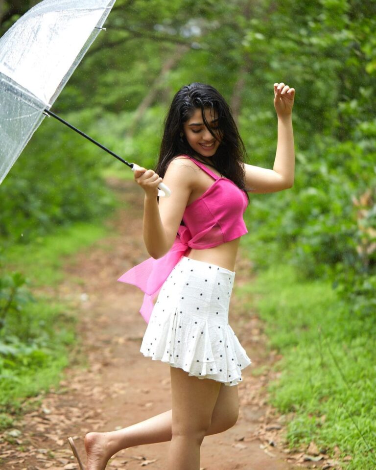 Krithi Shetty Instagram - Barbie-ing in the rain 🌧️💓 #barbie #rain 📸 @prabal