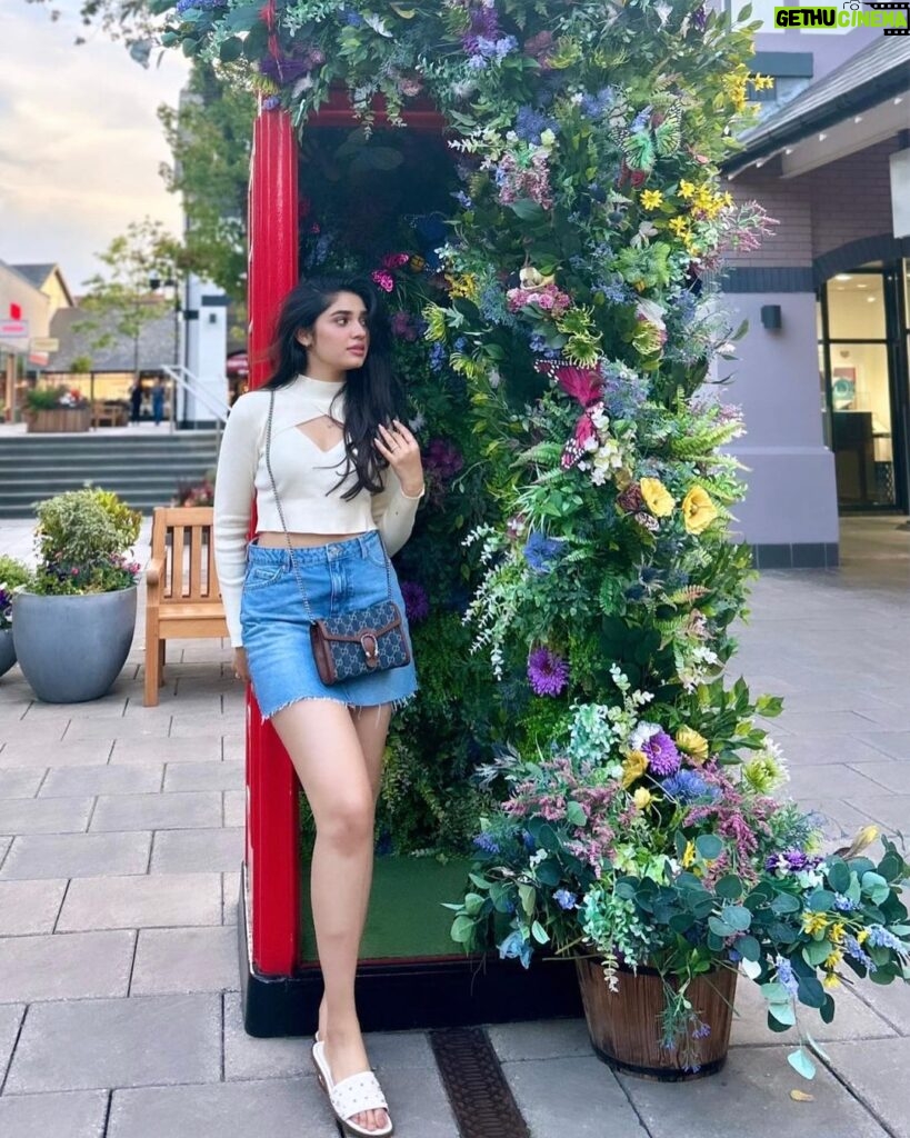 Krithi Shetty Instagram - The time you are taking right now to embrace your slow and steady growth matters more than you know…..remember….flowers don’t bloom in a day 🌸❤️ #london #flowers #blooming #loveyourself #butterfly #dayout