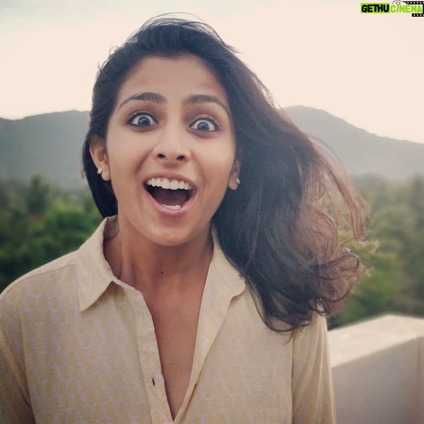 Kruthika Jayakumar Instagram - Heyyyyy it's raining 😮 SWIPE➡️ to see my funny excited face😂 Posting in honour of my love for rain 🌧️😍 . . . . . #bangalorerains #yogisofinstagram #mysoredays #ashtangayoga #candidiswear #candid #shotononeplus #fitgirl #fitfam #windy #rainydays #monsoon #yellow #toomanyhashtags #tollywood #sandalwood #kavacha #actor #dancer #yogisofig #throwback #tb #happyfaces Ashtanga Yoga Mysore