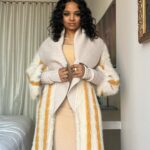 Kyla Pratt Instagram - Had fun running around Times Square ☺️ Coat & Dress @sarawongofficial Jewelry @sterlingforever Shoes @femme_la Styled by @v.msmith Make up @jessicasmalls Hair @lurissaingridhair Times Square, New York City