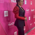 Kyla Pratt Instagram - One more time for this suit 🌹 And my date ☺️ Ma 💋 @naacpimageawards nominee luncheon ❤️🖤 Hair @a1hair_ Make up @makeupbykweli Styled by @v.msmith Suit @cristallini_official Jewelry @sterlingforever Www.naacpimageawards.net Go Vote Now 😜