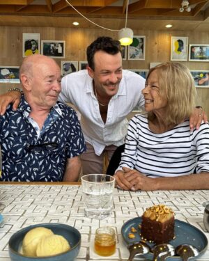 Kyle Schmid Instagram - A few months ago I received a call that my mother had been rushed to the ER. I stuttered in response, “I’ll be on the next flight home”. I had stepped out of a movie to take the call and my hands trembled as I tried to text my wife that we needed to leave. I took a seat on the floor of the lobby of the theatre and tried to steady myself as a numbness swept over me. 

Around christmas of 2022, doctors discovered a brain tumour. In January, they operated and found that it had metastasized from lung cancer. My mother, a life long smoker, bravely took the deep dive into chemo/radiation treatments and continued to fight as best she could. 

By August, she’d completed treatment taking on one hurdle after the next. I would fly home to check in and help out, to tell her I loved her and confidently encourage her that she’d beat the disease. She was always cold despite the temperature and always wore a sweater. It wasn’t until one of my last trips home, I really got to see how skinny she’d become. I remember giving her a big hug. I then went down to my room and I cried. It was the first I recognized my mother’s mortality. You see, my mom was a bad ass barn-bitch, she’s brave and courageous, but that doesn’t help when your treatments make it nearly impossible to eat or drink.

In October she started the next treatment - chemo every three weeks for the next two years. It was a daunting undertaking. She was tired and weak, but every once in a while we’d talk and she’d pipe up with this bit of energy and it make me wonder (if only for a moment) if this had all just been a dream. 

My mom taught me that it was important to have integrity. She taught me that nothing gets done without hard work. She drove me to soccer practices or auditions almost every night of the week and damn, was she was the most incredible cook. We always looked forward to the “clean out the fridge nights” to see what she’d come up with. She encouraged me to become an actor and helped me to be brave in the face of teenage insecurities. She poured herself into our lives as a mother. 

To be surrounded by family was all you ever wanted and on that last day you were. I will forever and always miss you ma. ❤️
