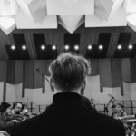 Lado Kvataniya Instagram - Я всегда мечтал, чтобы в моем фильме звучал оркестр. Когда я предложил @kirillrichter выступить в качестве композитора, то очень опасался, что его масштабная музыка будет не соответствовать содержанию фильма. Музыка будет глубже, сложнее, изобретательнее, чем события, разворачивающиеся на экране. При этом я понимал, что мне хочется работать с автором, который будет интерпретировать увиденное иначе, по-своему, и, может быть, мы будет спорить, ругаться, ненавидеть друг друга. ⠀ Мы работали в новой для меня форме - большая часть музыкальных композиций были написаны еще до начала съемок. Мы встречались с Кириллом и мне приходилось пересказывать линии персонажей, раскрывать суть героев, много говорить о фильме, которого еще нет. Нет, он есть, но пока на бумаге и в моей голове. Удивительно, но это сработало, Кирилл нашел главную тему задолго до первого съемочного дня. То что раньше существовало в области чувств, фантазии, галлюцинации, вдруг обрело форму. Для меня первый съемочный день случился не на площадке, а именно в тот момент, когда я услышал главную тему фильма, тогда придуманный мир начал воплощаться в реальности. ⠀ Я решил вам показать маленький отрывок рабочего процесса. Пусть это будет музыкальным тизером нашей “КАЗНИ”. ⠀ #казнь #hypefilm Russia