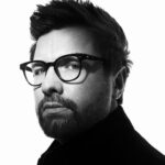 Lado Kvataniya Instagram - 8 октября состоится европейская премьера картины в рамках Sitges Film Festival. Поделюсь небольшим отрывком из интервью для @kinopoisk: ⠀ ⠀ На что вы опирались при воссоздании атмосферы советской эпохи? ⠀ ⠀ Мне хотелось создать художественную интерпретацию эпохи, а не заниматься исторической реконструкцией. Визуальным вдохновением служили фотографии той эпохи, документальные фильмы и советская живопись, в том числе периода оттепели. ранние фильмы Никиты Михалкова, Георгия Данелии, Алексея Германа, я его большой поклонник. Изучал советское кино с точки зрения атмосферы, настроения, работы с фактурой. ⠀ ⠀ С какими трудностями вы столкнулись во время работы? ⠀ ⠀ Одной из самых сложных задач было найти поле, где нам предстояло построить дом. Мы отправились почти в двухмесячное путешествие по ближайшему Подмосковью, проходя в день по 10-15 километров. Небольшой группой ехали в приглянувшиеся направление, пробирались сквозь чащи леса, и, дойдя до места, смотрели с дрона, подходит ли нам место. Дом, который мы возводили для съемок – тоже один из героев фильма. В его основе – образ разложения, распада. Он отражает героев и время действия. При детальном рассмотрении на его стенах увидеть пятна, которые присущи трупам. ⠀ ⠀ Как музыка, написанная Кириллом Рихтером, дополняет фильм? ⠀ ⠀ Кирилл предложил написать основные музыкальные темы до начала съемок, чего ни я, ни он никогда раньше не делали. Подробно проходя по главным персонажам, Кирилл делал эскизы и сформулировал главные темы. И было очень комфортно в момент, когда мы снимали ту или иную сцену, подставлять музыку и смотреть, насколько она гармонирует с тем, что я сейчас реализую. Это помогало понять, какая атмосфера у нас в фильме, какое настроение и детализация. Я не лез к Кириллу с пожеланиями, а, наоборот, старался дать максимальную свободу, чтобы он почувствовал себя полноценным соавтором. ⠀ ⠀ 📸: @klepnev ⠀ ⠀ #казнь Russia