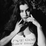 Lauren Jauregui Instagram - Said it w my chest! Merch available now at the link in my stories & bio ✨🤍 Model: my beautiful friend Malik Flournoy-Hooker
