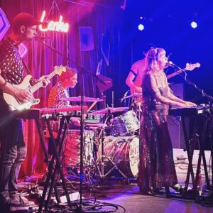 Lenka Instagram - Thank you Sydney for the perfect show to end this tour! 

So special to have friends and family there too to enjoy my last show for 2023. Thanks to my amazing band @davejenkinsjr @bnjmncrbtt @r_m_james and @jeffeofficial for being a lovely opening act and to @craftmusicagency for putting together this run…
Amazing rainbow skirt by @frankies_melbourne 
Photos by @electricdna 
🌈💋🌈💋🌈💋🌈💋