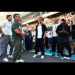 Liam Hemsworth Instagram - Had an awesome day at #AbuDhabiGP ! Walking the grid before the race was wild! Big thanks for having us all. Looking forward to the next one! ☝️