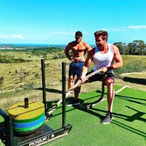 Liam Hemsworth Instagram - Took it upon myself to teach @rossedgley how to train properly. With my help I see some real potential in him. Keep up the good work little guy ;)