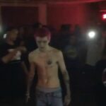 Lil Peep Instagram - 6 years ago today Gus performed his first show. The show took place on February 13, 2016 in Tucson, Arizona with Schemaposse.  I bought him a ticket to fly out of JFK on February 12.  His friends--JGrxxn, Ghostemane—would meet him at the airport and take care of him. As he psyched himself up for this new stage in his life, Gus had an instinct that he needed to have some sort of signature style—a “look” that would set him apart.  He decided that he wanted pink hair.  To get color, he had to bleach the hair first.  Emma was good at this stuff, so she was put in charge of getting the hair supplies.  After they bleached his hair, she put the hair dye in.  When it was all done, he hated it.  It was a very pale pink.  He threatened to shave his head bald.  By this time, it was getting pretty late in the evening.  Emma, Gus’s friend Ian and I were all sitting there.  None of us were particularly startled or bothered by this threat since Gus was always shaving his hair off and then growing it out again.  He wanted very bright pink.  So, Emma ran across the street to the Rite-Aid and came back with the bright magenta color that we can see in the photos Gus took of himself February 9 and 10, 2016.  He loved it.  He loved it so much that he took many photos of himself posing with this new hair color and even sent me a short video (in the middle of my school day).  He had taken this short video of himself and Taz lying on my bed—which matched his hair!  NOW he was prepared to perform at his first concert.   The show took place in a small warehouse room filled with a bunch of dedicated fans who knew the lyrics to Gus’s Beamer Boy by heart.  He also performed Lil Kennedy, Pray I Die, Let Me Bleed,  Praying To The Sky, The Pull Off, and Words You Hear On A Sinking Ship. His fans remain loyal and passionate six years later.