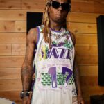 Lil Wayne Instagram - Teamed up with @bleacherreport & @mitchellandness to remix the original New Orleans Jazz jersey. 🤙🏾 Limited edition collection on sale now! Link in bio. Shoutout @pelicansnba