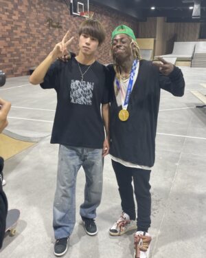 Lil Wayne Instagram - Gold status!! Dat my slime YM Yuto! He goat gang fresh 4L on gang! Dat medal as heavy as my YM piece! Bling on a string! In the words of Yuto…”first try bish”❗️