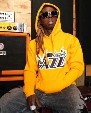 Lil Wayne Instagram - Teamed up with @bleacherreport & @mitchellandness to remix the original New Orleans Jazz jersey. 🤙🏾

Limited edition collection on sale now! Link in bio. Shoutout @pelicansnba