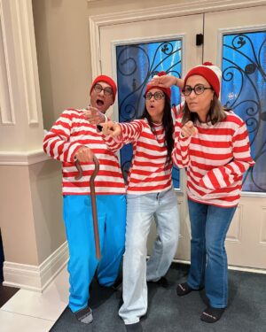 Lilly Singh Instagram - My mom’s favourite activity is playing Where’s Waldo. Naturally I had to get us these matching Halloween costumes. I feel like the older I get, the more I want to give my parents opportunities to act like children and have fun. They spent most of their life being responsible, so today… we eat candy and dance to the Monster Mash 🫡