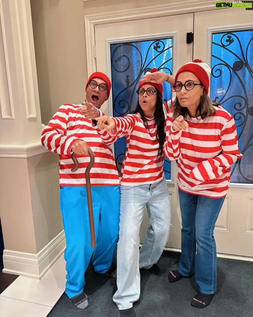 Lilly Singh Instagram - My mom’s favourite activity is playing Where’s Waldo. Naturally I had to get us these matching Halloween costumes. I feel like the older I get, the more I want to give my parents opportunities to act like children and have fun. They spent most of their life being responsible, so today… we eat candy and dance to the Monster Mash 🫡