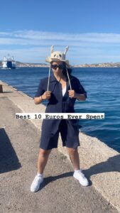 Lilly Singh Instagram - I know every other girl travelling in Europe rn is posting fabulous candid pictures on a boat for your feed BUT DO THEY HAVE THIS HAT?! 😂😂 I’ve been laughing for 30 minutes over this. LMAOOOO damn. I love how stupid I am 😍😂 #italy #sardinia #besthatever Sardinia,italy