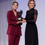 Lilly Singh Instagram - I know I look like I just sold your house in this photo. It’s giving real estate agent, but I’m actually just so happy. Here’s why: Last week I received the @DVF Leadership Award, among 4 other amazing women in Venice, Italy. Aside from this being a massive honor, the award also includes a grant to @UnicornIsland Fund, my charity that is on a mission to end gender inequality. And these resources are going to go so far in helping our work and mission. To get really honest, here’s why I’m emotional. For the past 10 years of my life, I’ve known I wanted to be of service in this fight. I’ve had and continue to have such a deep desire to make the world a more just place for girls and women. But it’s been confusing, complex and difficult to understand how exactly to tackle this issue in a way that actually helps and makes sense. I had to find a way to contribute by using my unique skills. And over the past year, I feel like I’ve finally figured it out. I believe in the power of storytelling to change culture. And now I’m getting the resources, building the team, and doing the work to use storytelling and drive meaningful change. Everyday I dedicate time to thinking about my charity, and how we can drive impact. I think about how to make this entire complex issue more accessible to my audience. I read books and articles to continue learning about the issues, so I can begin to tackle the solutions. And in a few days, the team and I will be heading to India to learn more on the ground. I’m excited to take you on my journey. All this to say, moments of support like this really matter and really help. So yeah, that’s why I’m a happy, grateful little bean. And if you’d like to be a little bean with me, follow @unicornisland to join the mission! #UnicornIsland #UIF #UnicornIslandFund #DVFAwards