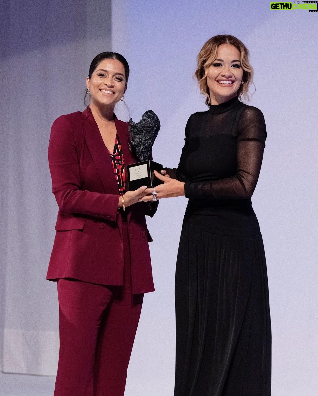 Lilly Singh Instagram - I know I look like I just sold your house in this photo. It’s giving real estate agent, but I’m actually just so happy. Here’s why: Last week I received the @DVF Leadership Award, among 4 other amazing women in Venice, Italy. Aside from this being a massive honor, the award also includes a grant to @UnicornIsland Fund, my charity that is on a mission to end gender inequality. And these resources are going to go so far in helping our work and mission. To get really honest, here’s why I’m emotional. For the past 10 years of my life, I’ve known I wanted to be of service in this fight. I’ve had and continue to have such a deep desire to make the world a more just place for girls and women. But it’s been confusing, complex and difficult to understand how exactly to tackle this issue in a way that actually helps and makes sense. I had to find a way to contribute by using my unique skills. And over the past year, I feel like I’ve finally figured it out. I believe in the power of storytelling to change culture. And now I’m getting the resources, building the team, and doing the work to use storytelling and drive meaningful change. Everyday I dedicate time to thinking about my charity, and how we can drive impact. I think about how to make this entire complex issue more accessible to my audience. I read books and articles to continue learning about the issues, so I can begin to tackle the solutions. And in a few days, the team and I will be heading to India to learn more on the ground. I’m excited to take you on my journey. All this to say, moments of support like this really matter and really help. So yeah, that’s why I’m a happy, grateful little bean. And if you’d like to be a little bean with me, follow @unicornisland to join the mission! #UnicornIsland #UIF #UnicornIslandFund #DVFAwards